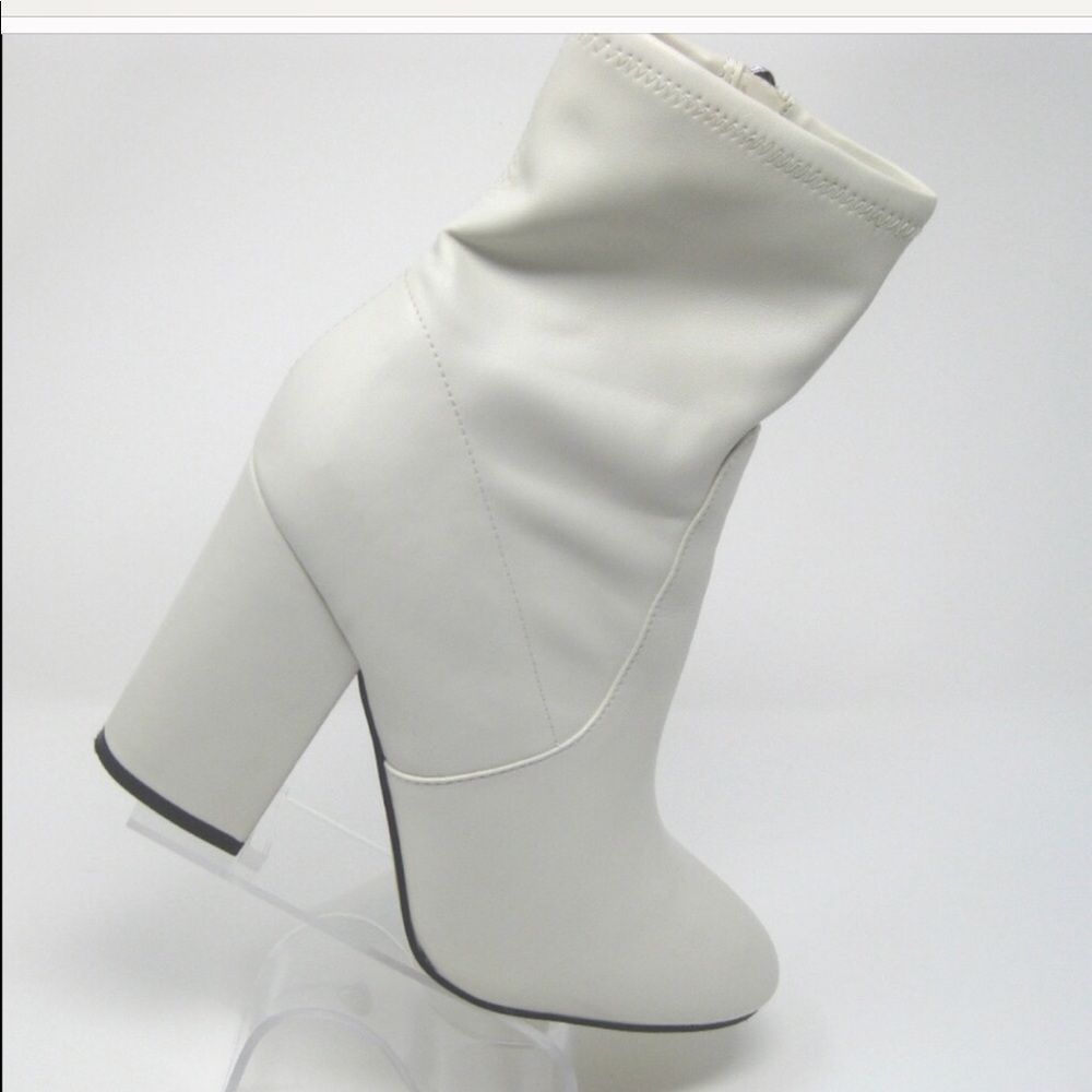 Marc Fisher boots w pen marks on them